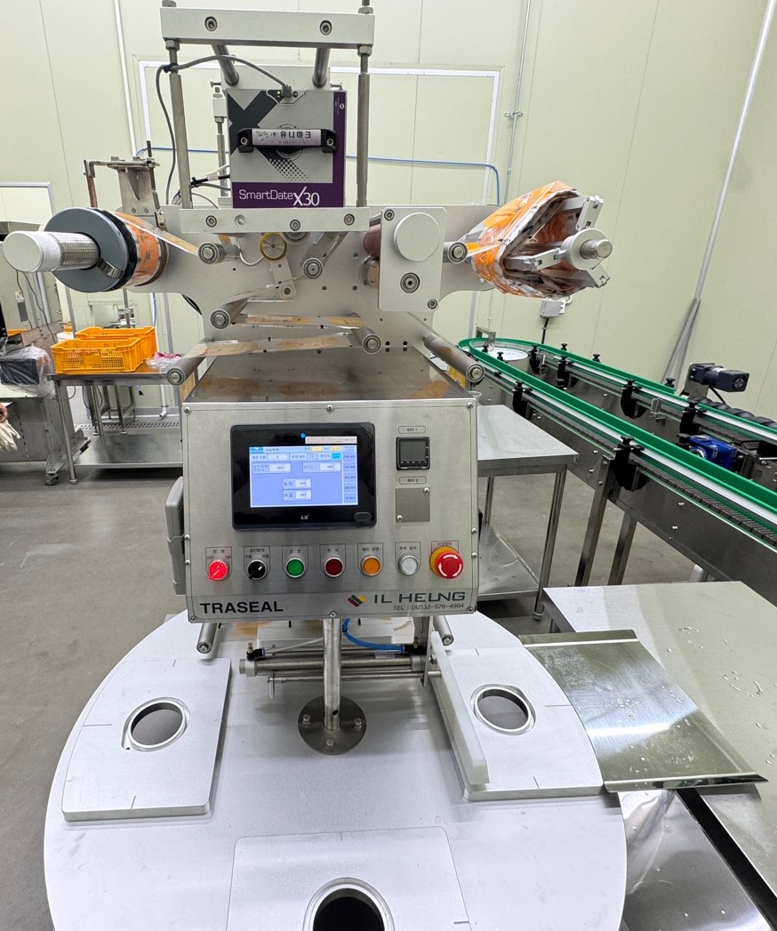 원형 용기 로타리 컵실러